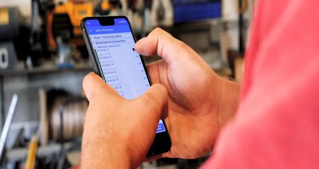 someone using rental software on a mobile app